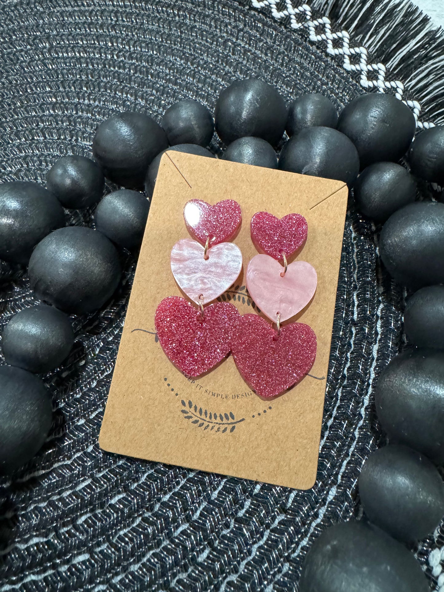 Pink triple heart dangle earrings